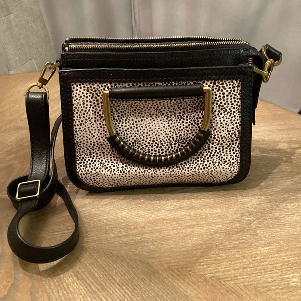 Black White Cow Hide Brass Fossil Purse